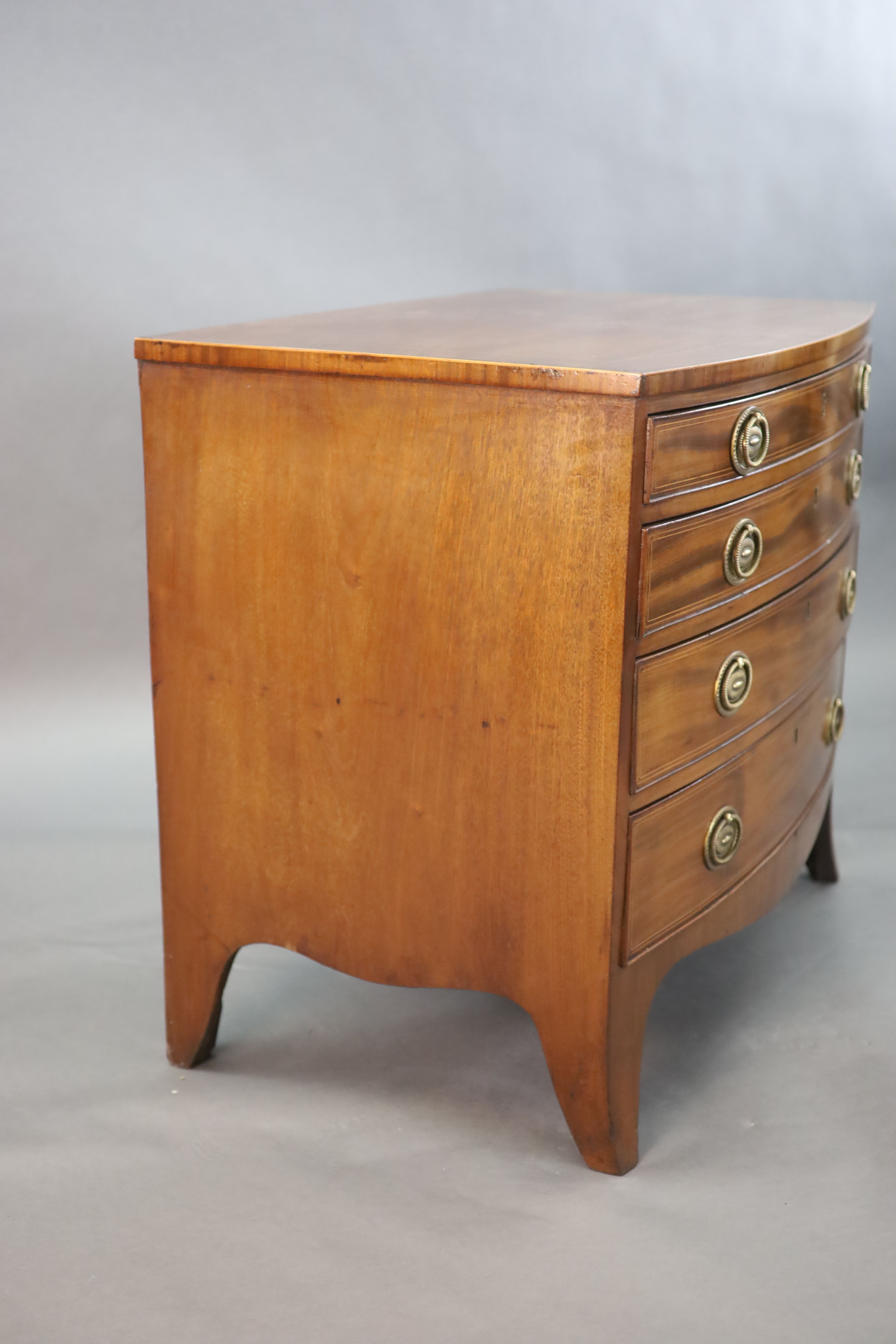 A Regency crossbanded mahogany bowfront chest, W.2ft 10in. D.1ft 10in. H.2ft 6in.